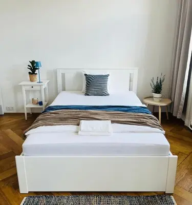 Ein Bett oder Betten in einem Zimmer der Unterkunft Modernes Design Apartment