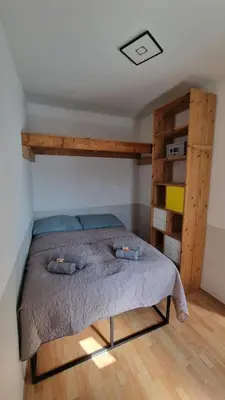 Ein Bett oder Betten in einem Zimmer der Unterkunft Ruheoase nähe Donaukanal