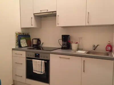 Küche/Küchenzeile in der Unterkunft Brand New - City Apartment - Quiet - Top 14