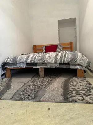 Ein Bett oder Betten in einem Zimmer der Unterkunft Ganzen Unterkunft 2 Zimmer