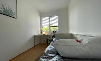 Ein Bett oder Betten in einem Zimmer der Unterkunft Green Garden Apartments