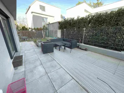 Ein Sitzbereich in der Unterkunft Green Garden Apartments