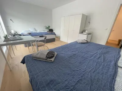 Ein Bett oder Betten in einem Zimmer der Unterkunft Green Garden Apartments