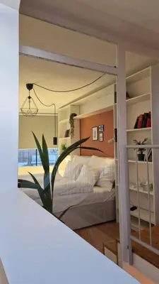 Ein Bett oder Betten in einem Zimmer der Unterkunft Drews Shelter - Charming Apartment