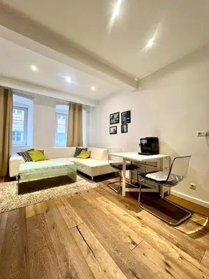 Ein Bett oder Betten in einem Zimmer der Unterkunft REMA Apartments 1070
