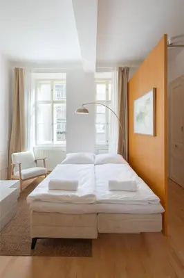Ein Bett oder Betten in einem Zimmer der Unterkunft Oona Boutique Apartments