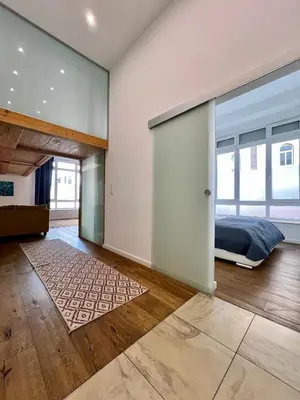 Ein Bett oder Betten in einem Zimmer der Unterkunft REMA Apartments 1080