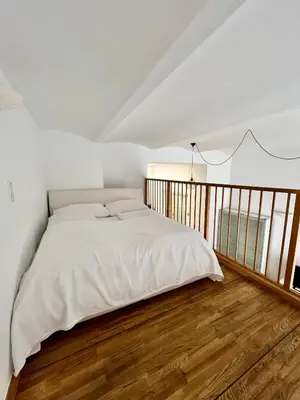 Ein Bett oder Betten in einem Zimmer der Unterkunft REMA Apartments 1080