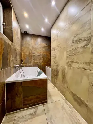 Ein Badezimmer in der Unterkunft REMA Apartments 1080