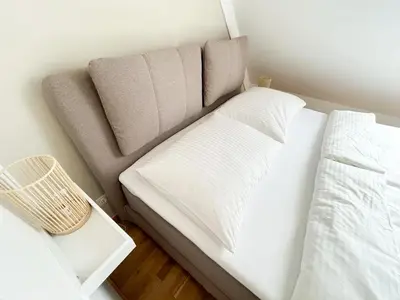 Ein Bett oder Betten in einem Zimmer der Unterkunft Ruhiger Familientraum fürs Wochenende oder längerfristigen Aufenthalt