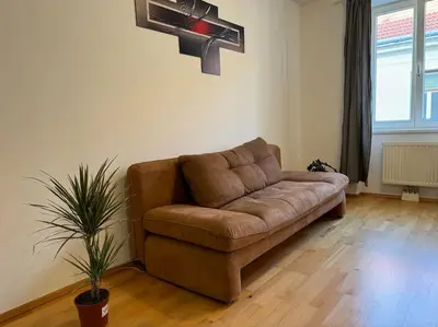 Ein Sitzbereich in der Unterkunft Apartment für 3 beim Westbahnhof