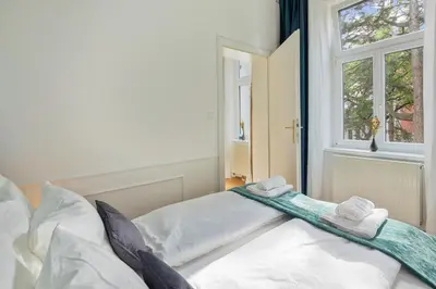 Ein Bett oder Betten in einem Zimmer der Unterkunft Blaues Wiener Refugium - Gym - Parking