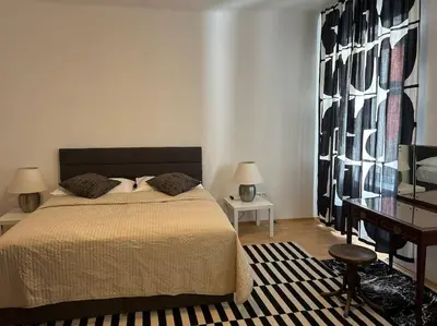 Ein Bett oder Betten in einem Zimmer der Unterkunft Apartment Saturn