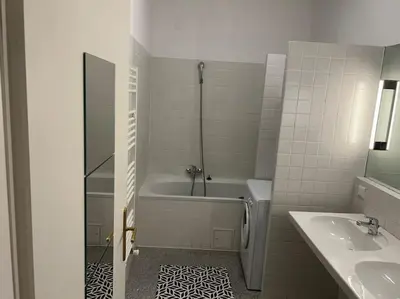 Ein Badezimmer in der Unterkunft Apartment Saturn