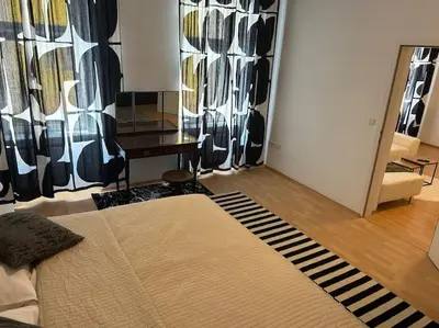 Ein Bett oder Betten in einem Zimmer der Unterkunft Apartment Saturn