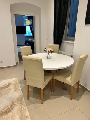 Ein Sitzbereich in der Unterkunft Apartment Jupiter