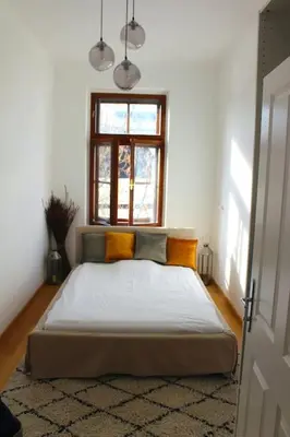 Ein Bett oder Betten in einem Zimmer der Unterkunft Paraderma Apartment im Zentrum Baden bei Wien