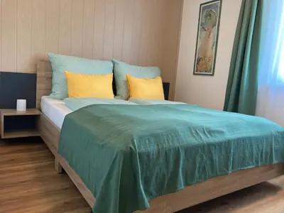 Ein Bett oder Betten in einem Zimmer der Unterkunft Familienparadies am Stadtrand