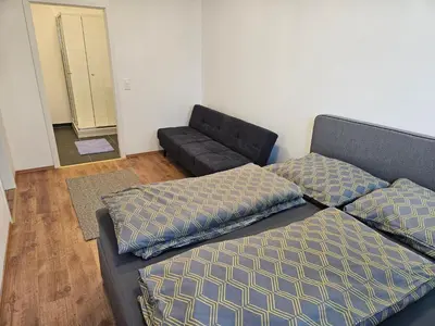 Ein Bett oder Betten in einem Zimmer der Unterkunft Roof-Top Apartment 25
