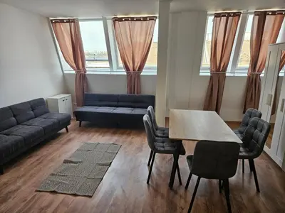 Ein Sitzbereich in der Unterkunft Roof-Top Apartment 25