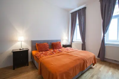 Ein Bett oder Betten in einem Zimmer der Unterkunft Apartment Theresiengasse