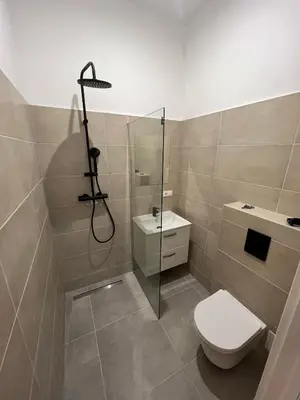 Ein Badezimmer in der Unterkunft City Flat C