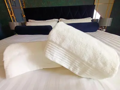 Ein Bett oder Betten in einem Zimmer der Unterkunft BOSSA CITY Design Apartments