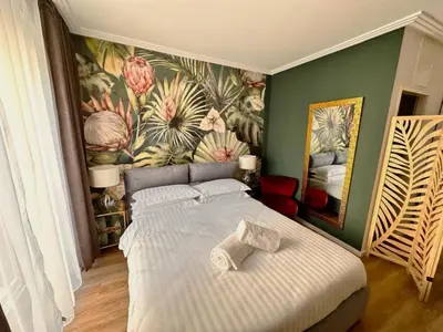 Ein Bett oder Betten in einem Zimmer der Unterkunft BOSSA CITY Design Apartments