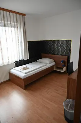 Ein Bett oder Betten in einem Zimmer der Unterkunft Pension Haus Nova