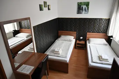 Ein Bett oder Betten in einem Zimmer der Unterkunft Pension Haus Nova