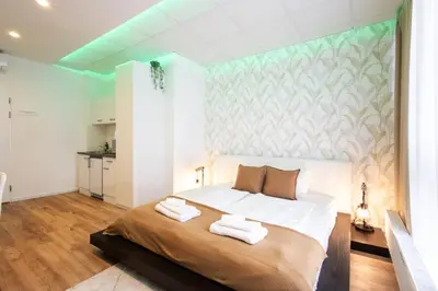 Ein Bett oder Betten in einem Zimmer der Unterkunft Livin Apartments - T75a