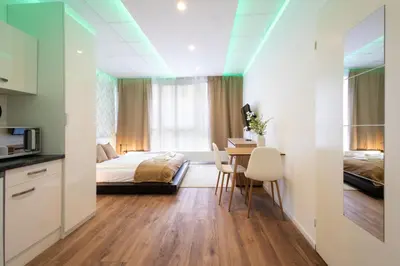 Ein Bett oder Betten in einem Zimmer der Unterkunft Livin Apartments - T75a