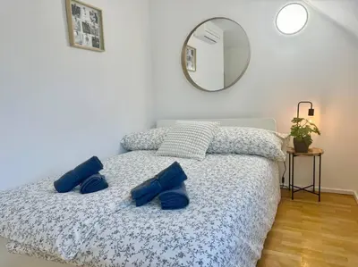 Ein Bett oder Betten in einem Zimmer der Unterkunft City Suites of BLE