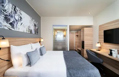 Ein Bett oder Betten in einem Zimmer der Unterkunft Leonardo Hotel Vienna Hauptbahnhof