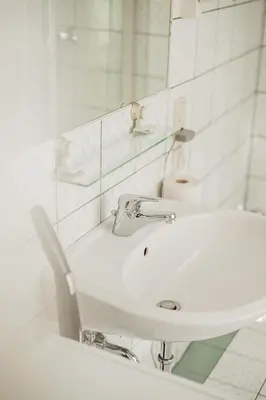 Ein Badezimmer in der Unterkunft Big Ceasars Volkstheater close to City Center