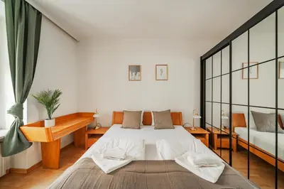Ein Bett oder Betten in einem Zimmer der Unterkunft Big Ceasars Volkstheater close to City Center
