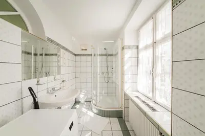 Ein Badezimmer in der Unterkunft Big Ceasars Volkstheater close to City Center