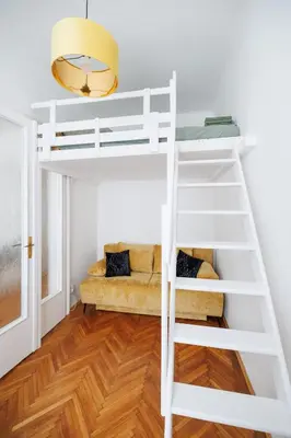 Ein Bett oder Betten in einem Zimmer der Unterkunft NEU VintageLivingVienna Apartments im 18ten
