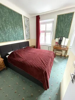 Ein Bett oder Betten in einem Zimmer der Unterkunft Hotel Viki