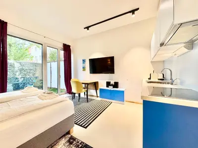 TV/Unterhaltungsangebot in der Unterkunft Möblierte Wohnung mit Terrasse