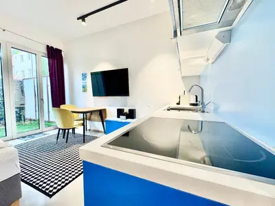 TV/Unterhaltungsangebot in der Unterkunft Möblierte Wohnung mit Terrasse