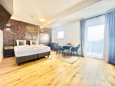 Ein Bett oder Betten in einem Zimmer der Unterkunft Gemütliche Wohnung mit Balkon