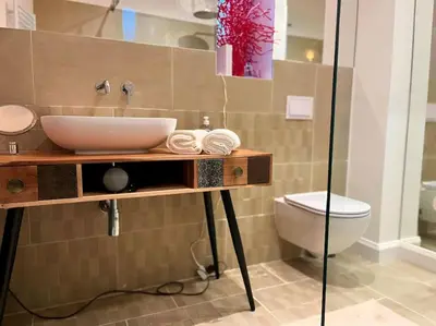 Ein Badezimmer in der Unterkunft Helle Erdgeschosswohnung, nahe Zentrum und Schoenbrunn