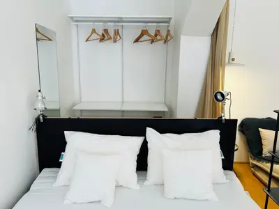 Ein Bett oder Betten in einem Zimmer der Unterkunft Flataid PremiumApart Museumsquartier