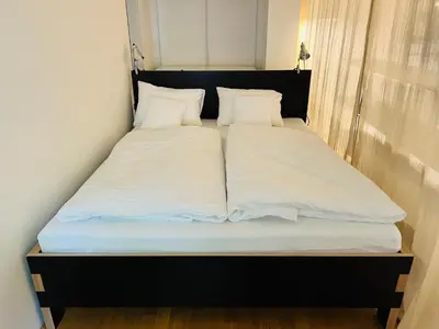 Ein Bett oder Betten in einem Zimmer der Unterkunft Flataid PremiumApart Museumsquartier