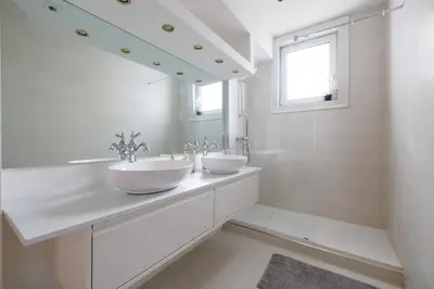 Ein Badezimmer in der Unterkunft Papageno Apartments