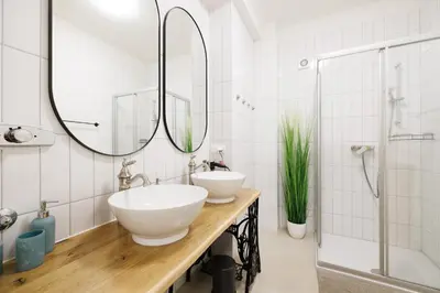Ein Badezimmer in der Unterkunft Papageno Apartments