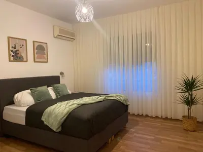 Ein Bett oder Betten in einem Zimmer der Unterkunft Zentrales Apartment Nähe Naschmarkt