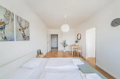 Ein Bett oder Betten in einem Zimmer der Unterkunft New renovated apartment at Hauptbahnhof