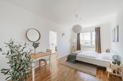 Ein Bett oder Betten in einem Zimmer der Unterkunft New renovated apartment at Hauptbahnhof